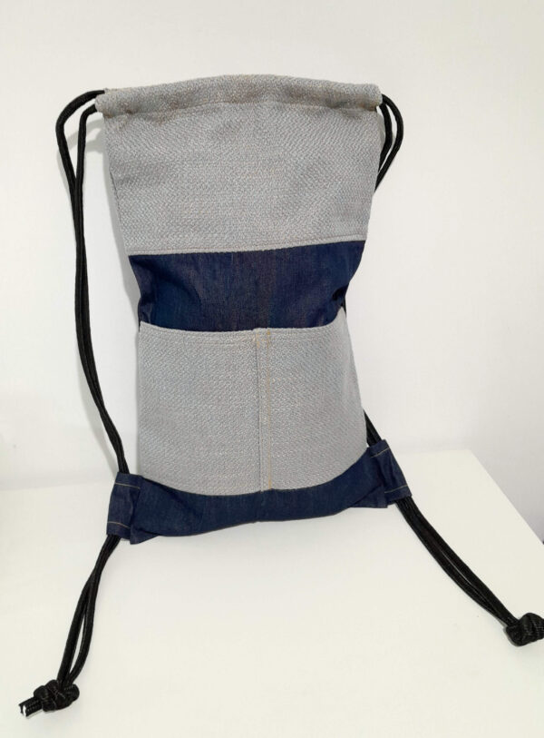 unisex backpack blue denim and light grey blueish padding cloth